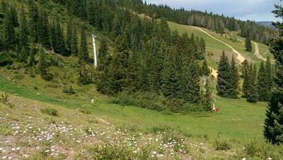 Lower open slopes of Kinnickinnick trail pass through ski operations