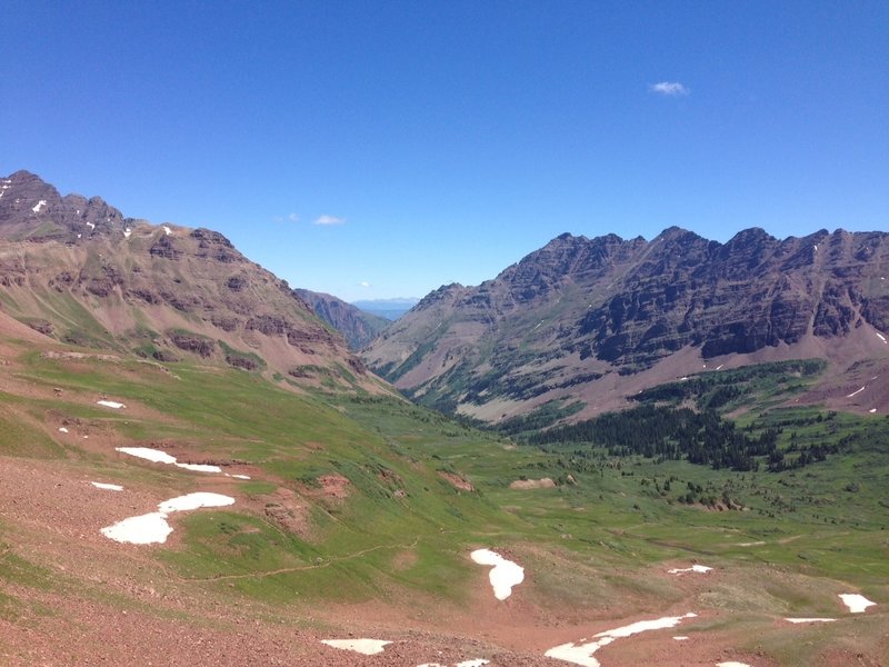 What a day in the mountains...Top of Maroon Pass looking way down toward my beer.