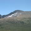 Mt. Bierstadt from the main TH. Much of the route is visible, with the trail starting from the lower left of the picture and jogging up the center hill. From here it passes along the summit ridge to the right. The sawtooth is to the left of the summit.