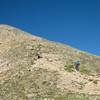 The crux of the route, a steep and slightly rocky pitch before the first false summit.