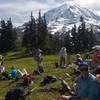 A group taking a well-deserved break at a pretty nice viewpoint...