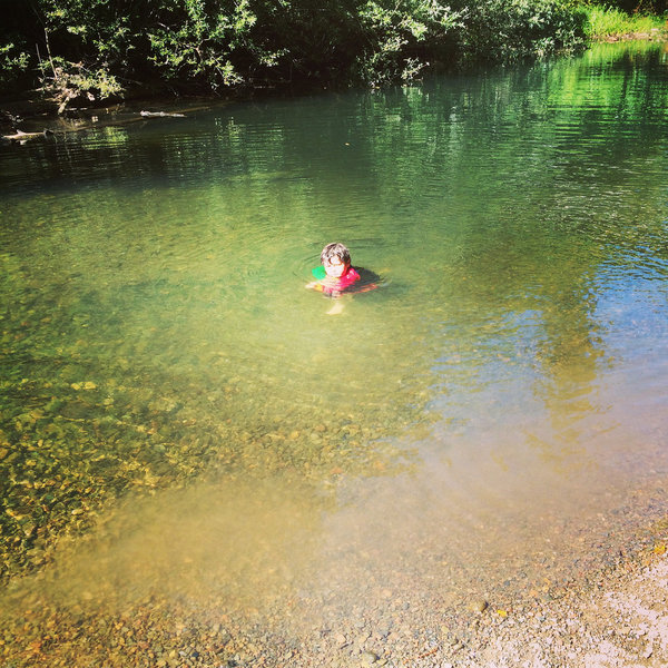 Taking a break from hiking the Cross Marin trail swimming in