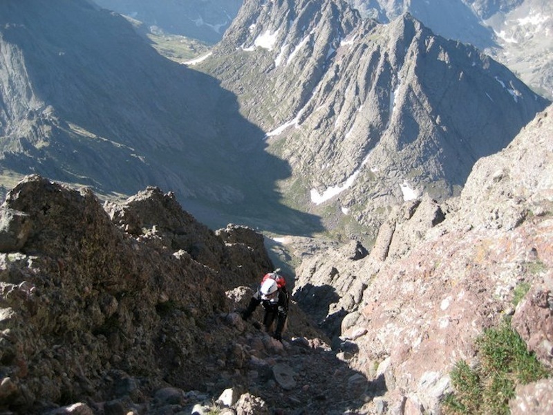 A hiker popping out of the west gully just before reaching the summit.