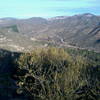 Looking back down to the ranger station. You can see "The Way Up" trail zig-zagging up the sunlit slope on the left.