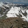 View from the summit of Castle Peak. To the left is the saddle to which you'll descend. Conundrum is right in front of you, with its technical couloir just right of center. Conundrum's summit is up and to the right of the couloir.