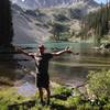 Triumphant at the gorgeous Avalanche Lake deep in the Elks.