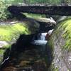 A bridge crossing over a stream at the beginning of the Johannsen trail.