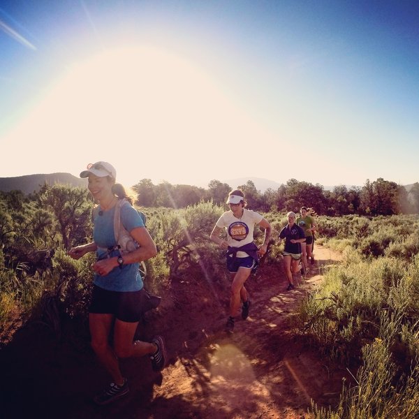 The ladies enjoy an evening romp through the sage meadows of the backside of Red Hill. Photo by Ann Driggers