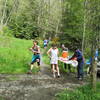 Trail runners refueling at an aid station during the 2014 OAT Run, held on this trail every April.