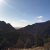 Looking southeast towards Denver. from the Eldorado Canyon Trail  Denver skyline visible through the haze in the "V" of the mountains.