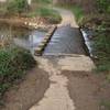 Creek crossing. You can run across the little concrete stumps