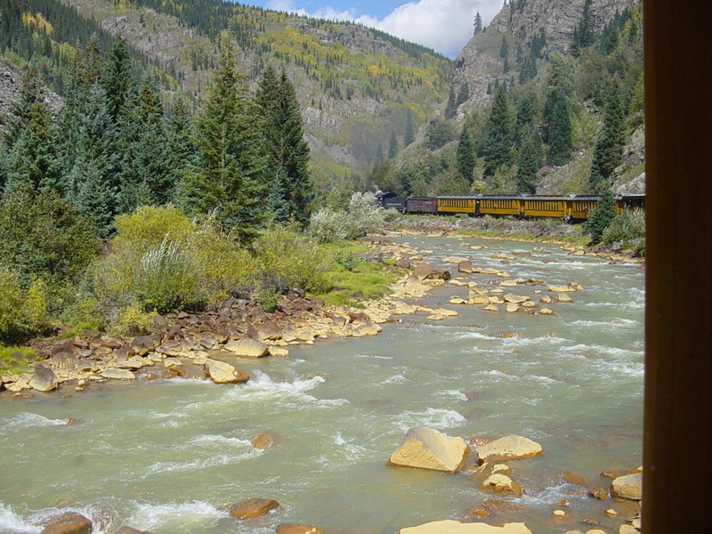 Train traveling along the Animas River