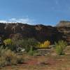 Following the old road between the red sandstone cliffs