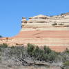 Striped sandstone cliff on the Jouflas Loop Trail