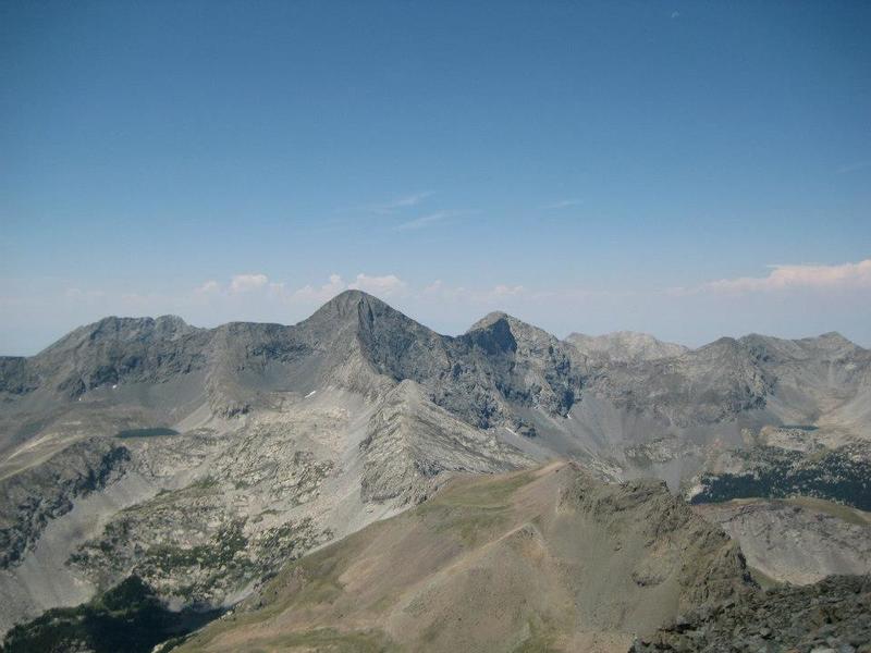 The Blanca Massif, visible from the summit. L to R: Little Bear Peak, Blanca Peak (tallest), Ellingwood Point. Gash Ridge, a low class 5 route, descends from Blanca's summit into the basin.