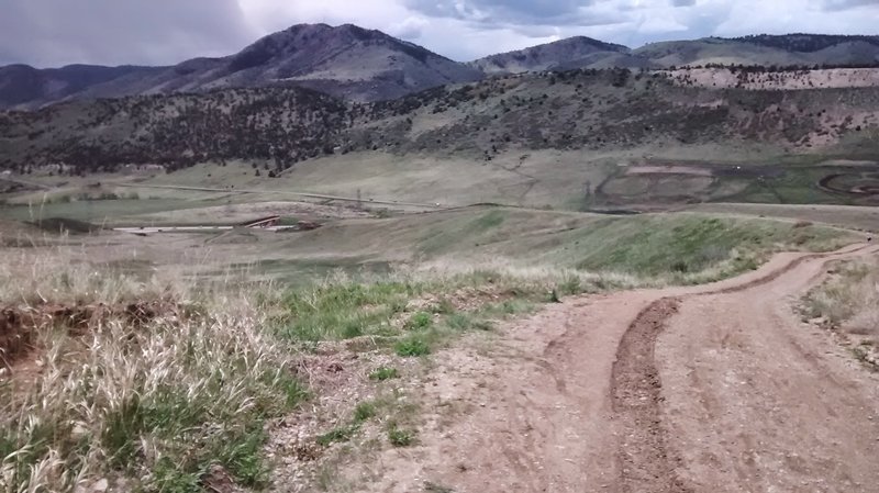 In the center left of the picture you can see the bridge that is right by the Rooney parking lot. Above that is Mt. Morrison which is just above Red Rocks Amphitheater.