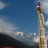 Prayer flag pole with Lhotse and Everest
