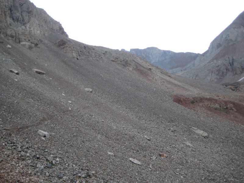 In Kilpacker Basin, approaching El Diente's southern slopes at sunrise.