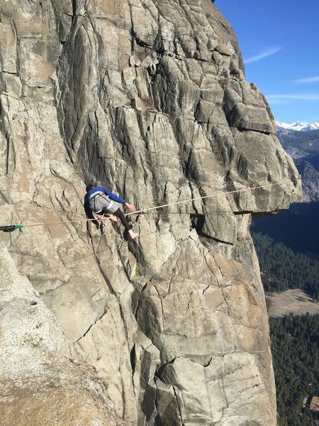 Slackliner at the top of Yosemite Falls