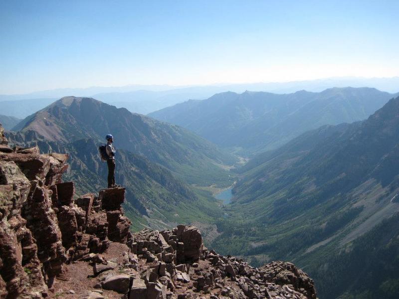 A pensive hiker soaks in the views from the top of the 2nd gully.