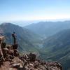 A pensive hiker soaks in the views from the top of the 2nd gully.