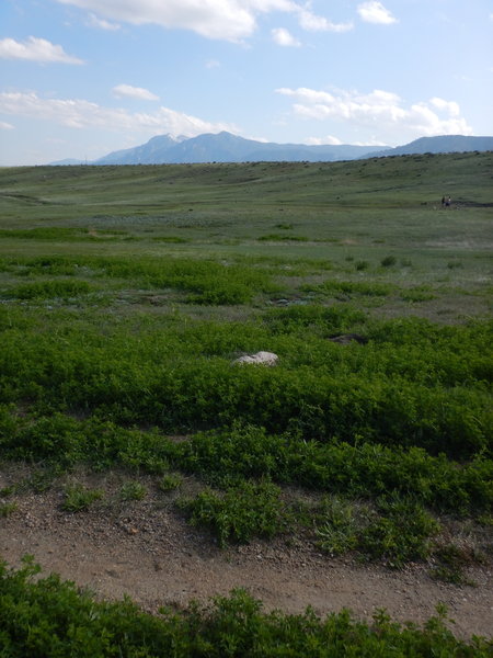 Ambling the western end of the Mesa Reservoir Trial, hikers in the distance are on the Hidden Valley Trail