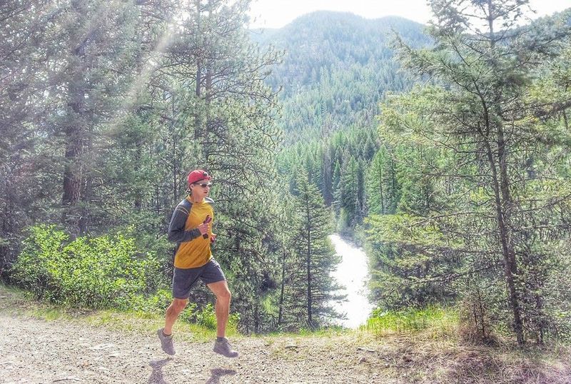 Running the Rattlesnake Trial with Rattlesnake Creek in the background.