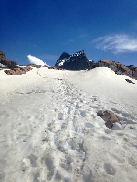 Slight snowpack scramble up to lake area in early May