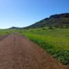 Further along the trail. You can clearly see Lizzard Rock in the distance straight ahead.