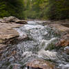 Cascades of water coming down the creek