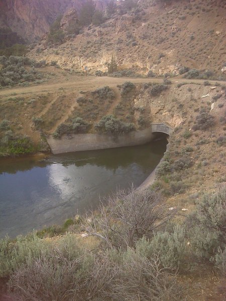 Irrigation ditch goes underground, don't let children or dogs fall in.