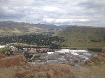 The Front Range north of Golden's Castle Rock from its summit. In view are the Coors Brewery and North Table Mountain.