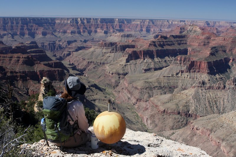 Resting at Komo Point.  The ball is a reference point used by Bradford Washburn during his aerial photography used to map the Grand Canyon.  (photo by brewbooks)