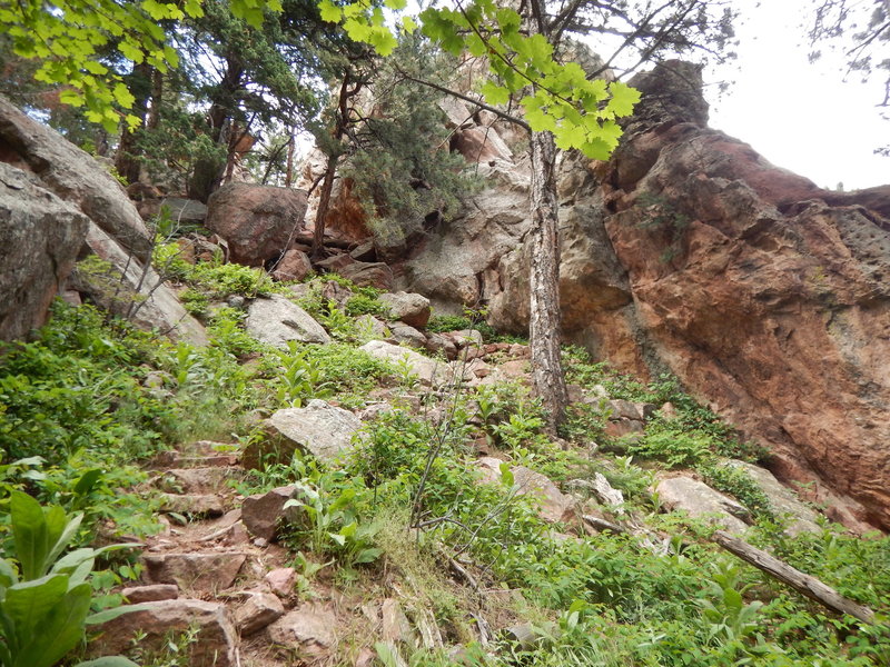 Scramble up through the notch to reach the climbing on the backside