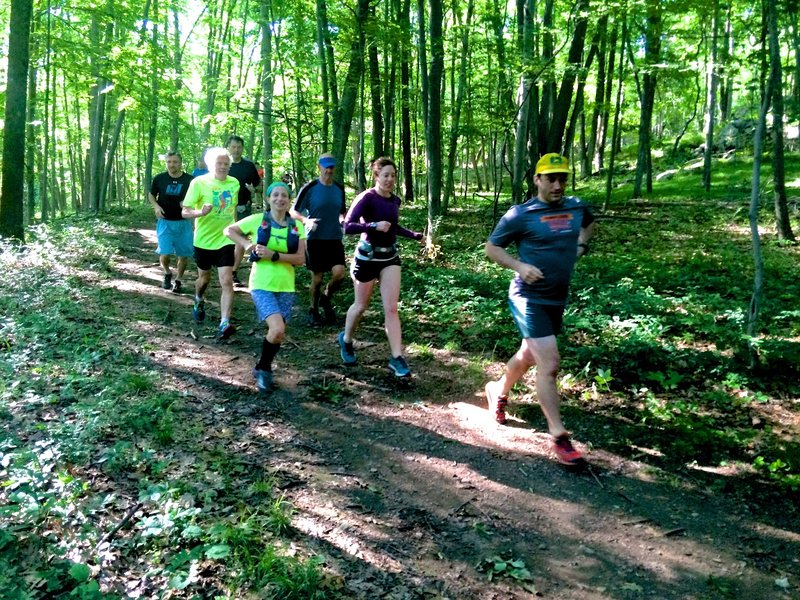 Heading out from the trailhead on a group run