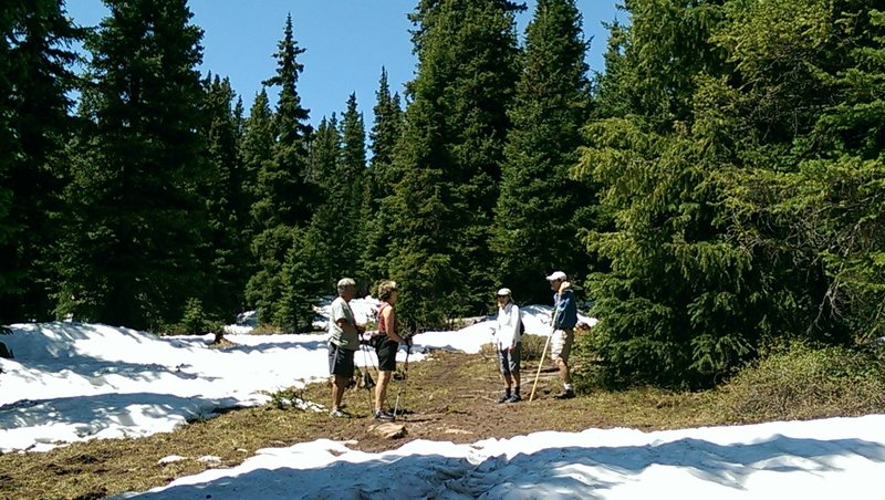 The treed sections of the trail hold snow a long time