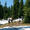 The treed sections of the trail hold snow a long time