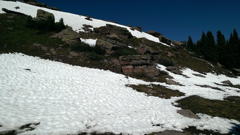 Huge chunky boulders below the ridge