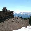 Red sandstone fin projects from the side of this mountian