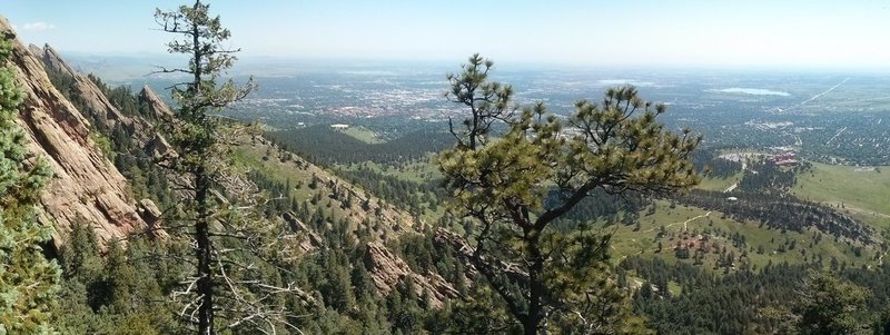 Looking out from ledge on Dinosaur Mountain trail that leads right above Mallory cave to rock climbing areas.