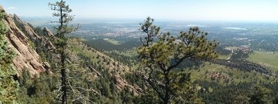 Looking out from ledge on Dinosaur Mountain trail that leads right above Mallory cave to rock climbing areas.