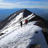 Hikers along the ridge, just a little above the switchbacking trail.