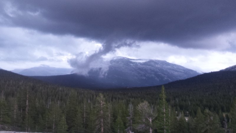 Storm rolling over Mammoth Mountain as seen in Tuolumne Meadows