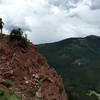 Taking in a spectacular view at an overlook atop final descent. Enjoy, but watch for loose rocks / exposure.