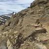 The start of the "red rock" East Ridge scramble section, nearing the top of the Cirque Trail