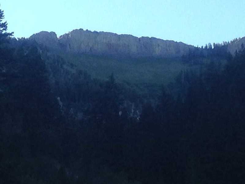 The large limestone cliffs that hang over the east wall of Birch Canyon