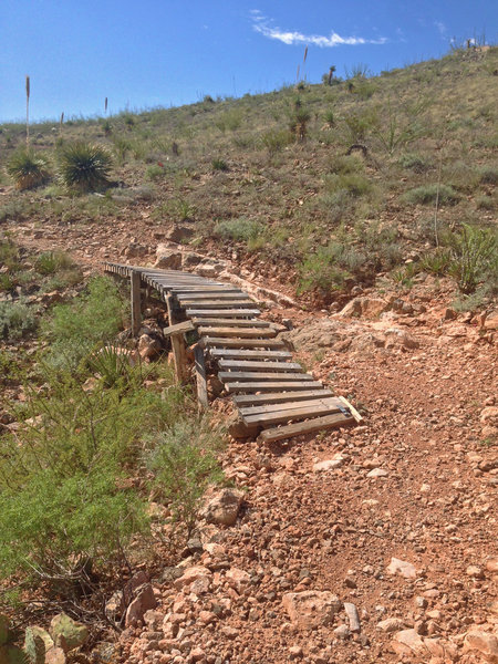 A short bridge for cyclists on Mayberry. The slats are far apart, so it's better to take the trail around instead.