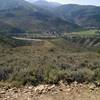 A peek up into the high mountains from Our Backyard Trail