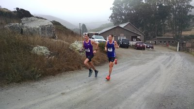 The men's leaders cruising through the fog.