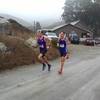 The men's leaders cruising through the fog.